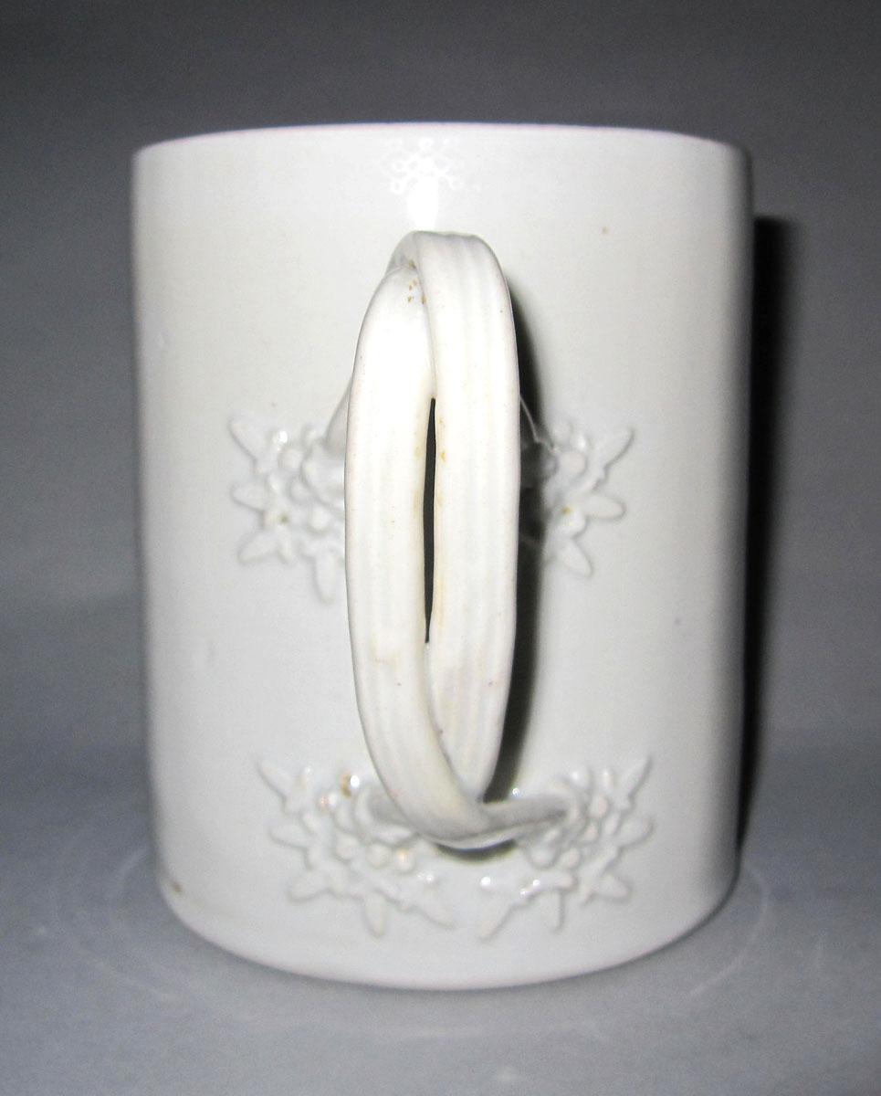 1956.0547 Porcelain mug handle