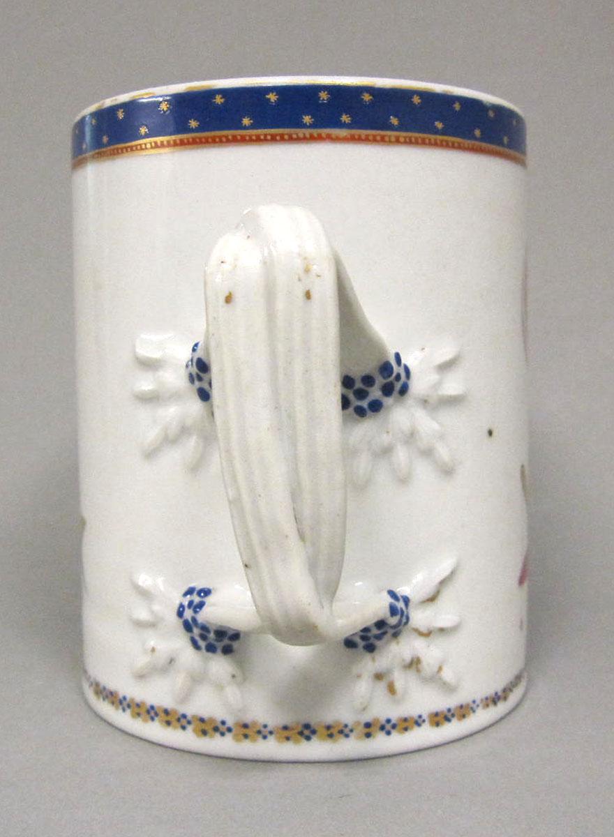 1956.0557 Porcelain mug handle