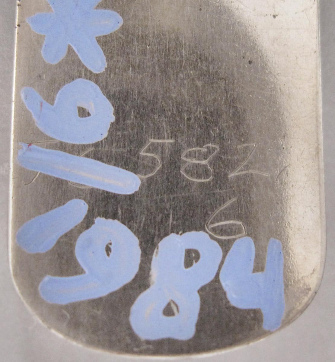 1956.0582.006 Spoon, inscription