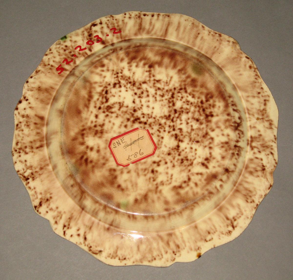 1952.0203.002 Creamware plate (underside)
