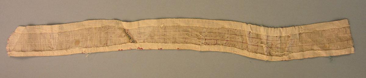 1956.0610 (assoc.) Textile, printed reverse
