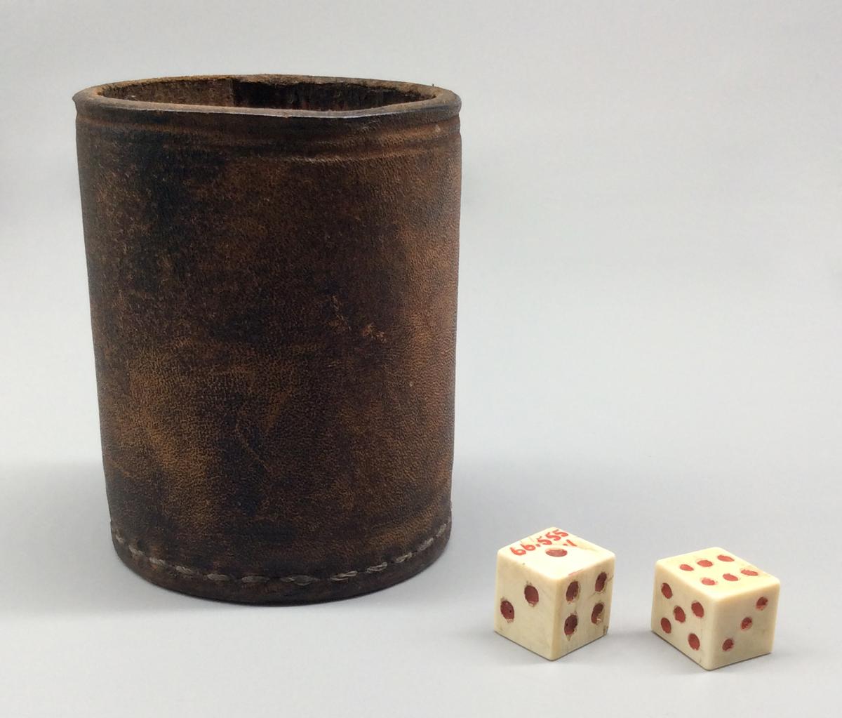 1966.0554.002 and 1966.0555.001-.002 Dice cup and Dice, view 1