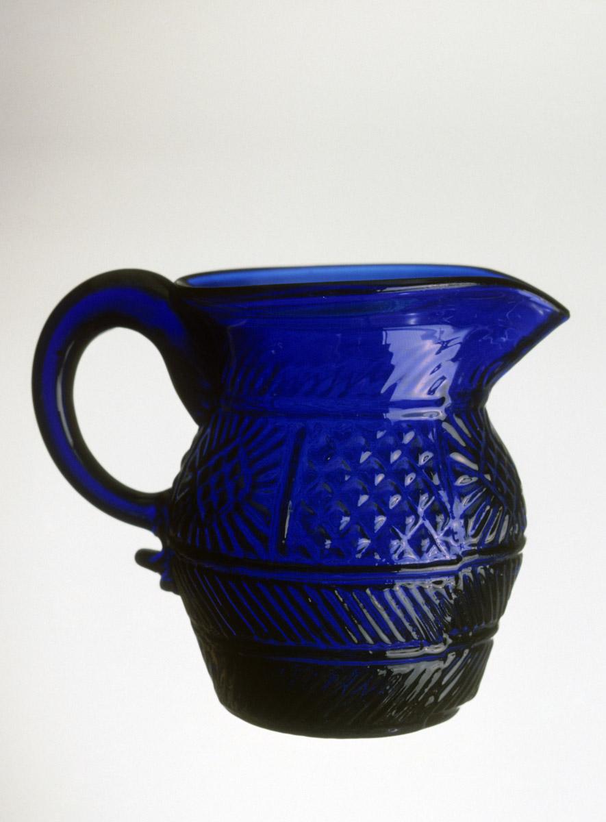 1957.0010.003 Blue glass jug