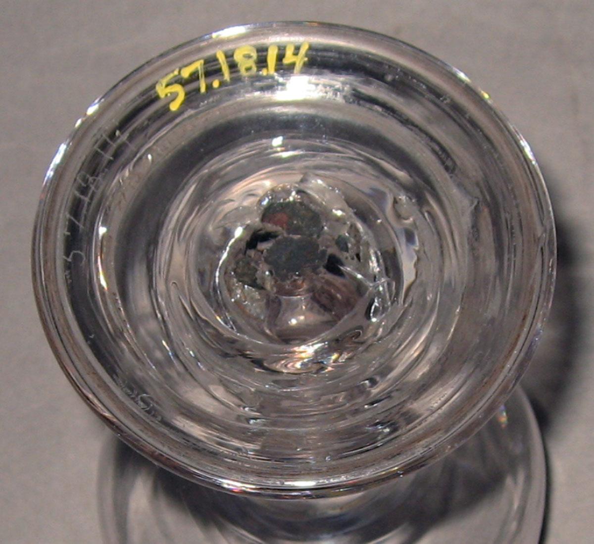 1957.0018.014 Colorless glass wineglass (underside)