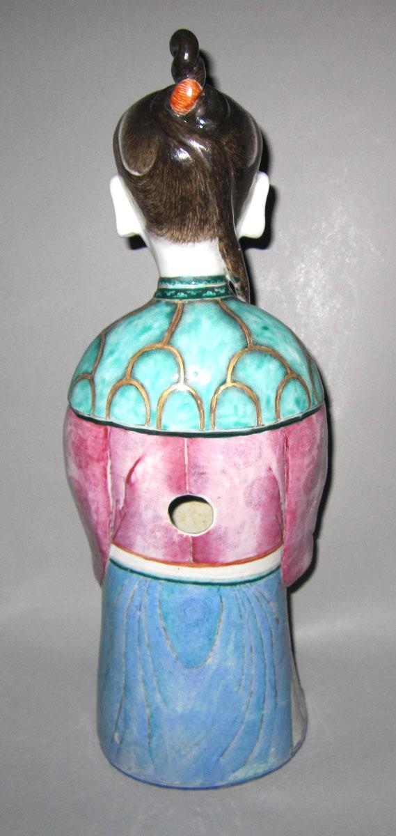 1966.0582 Porcelain figure face three