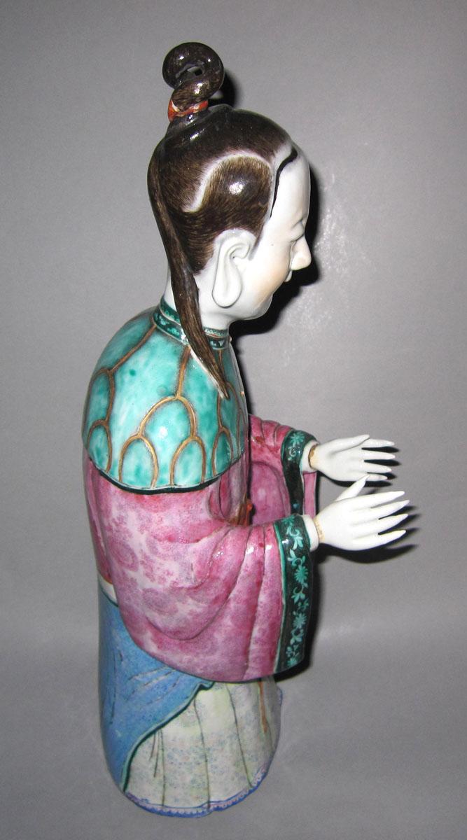 1966.0582 Porcelain figure face four