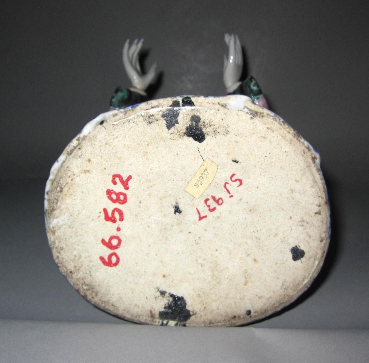 1966.0582 Porcelain figure underside