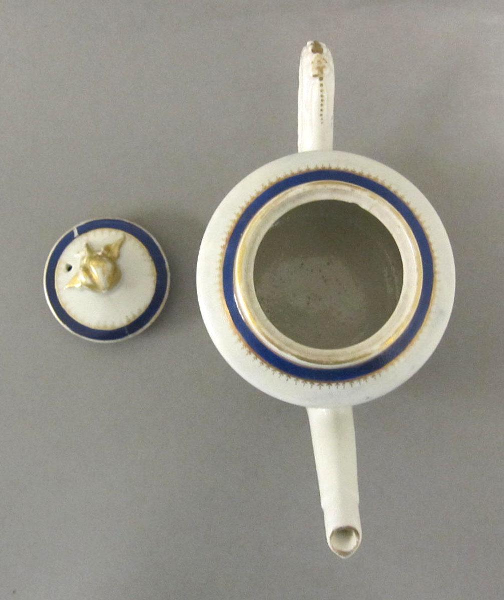 1966.0591.008 A,B Porcelain teapot top