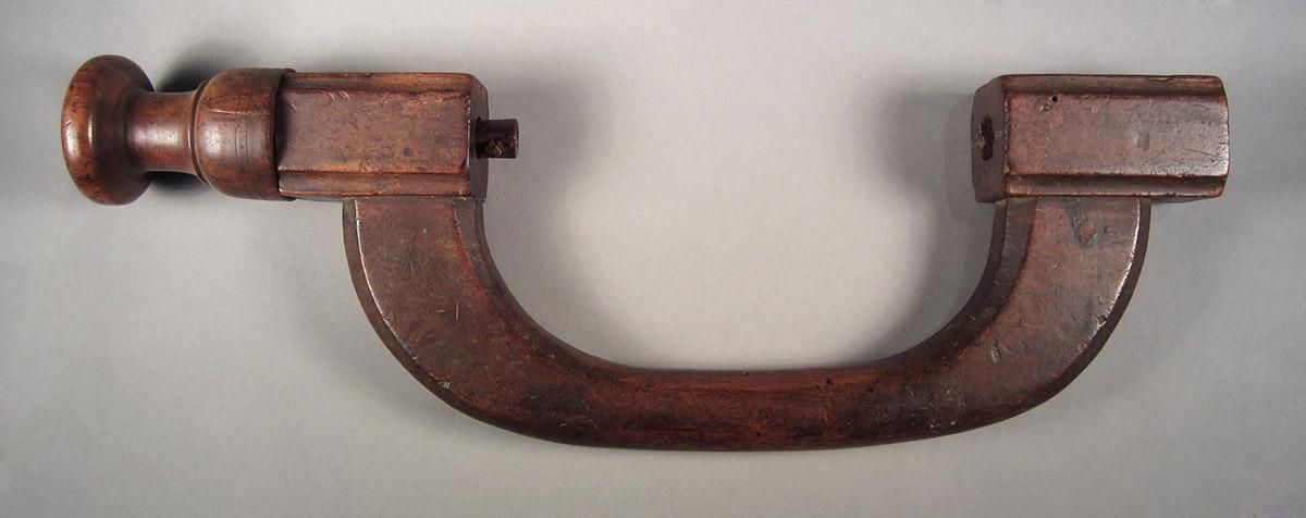 1957.0026.021, Brace, side 1