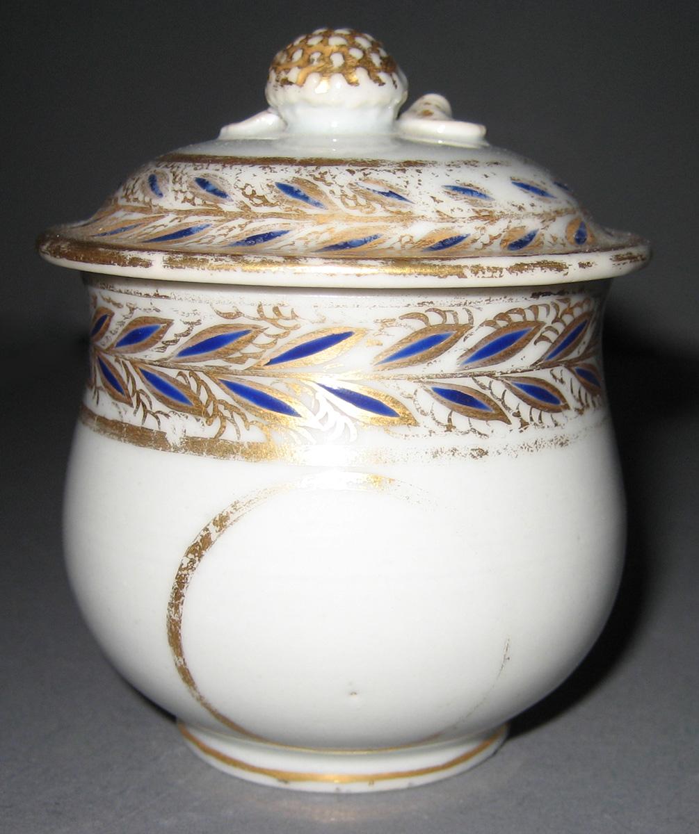 1966.0610.033 A, B Porcelain Pot de creme front