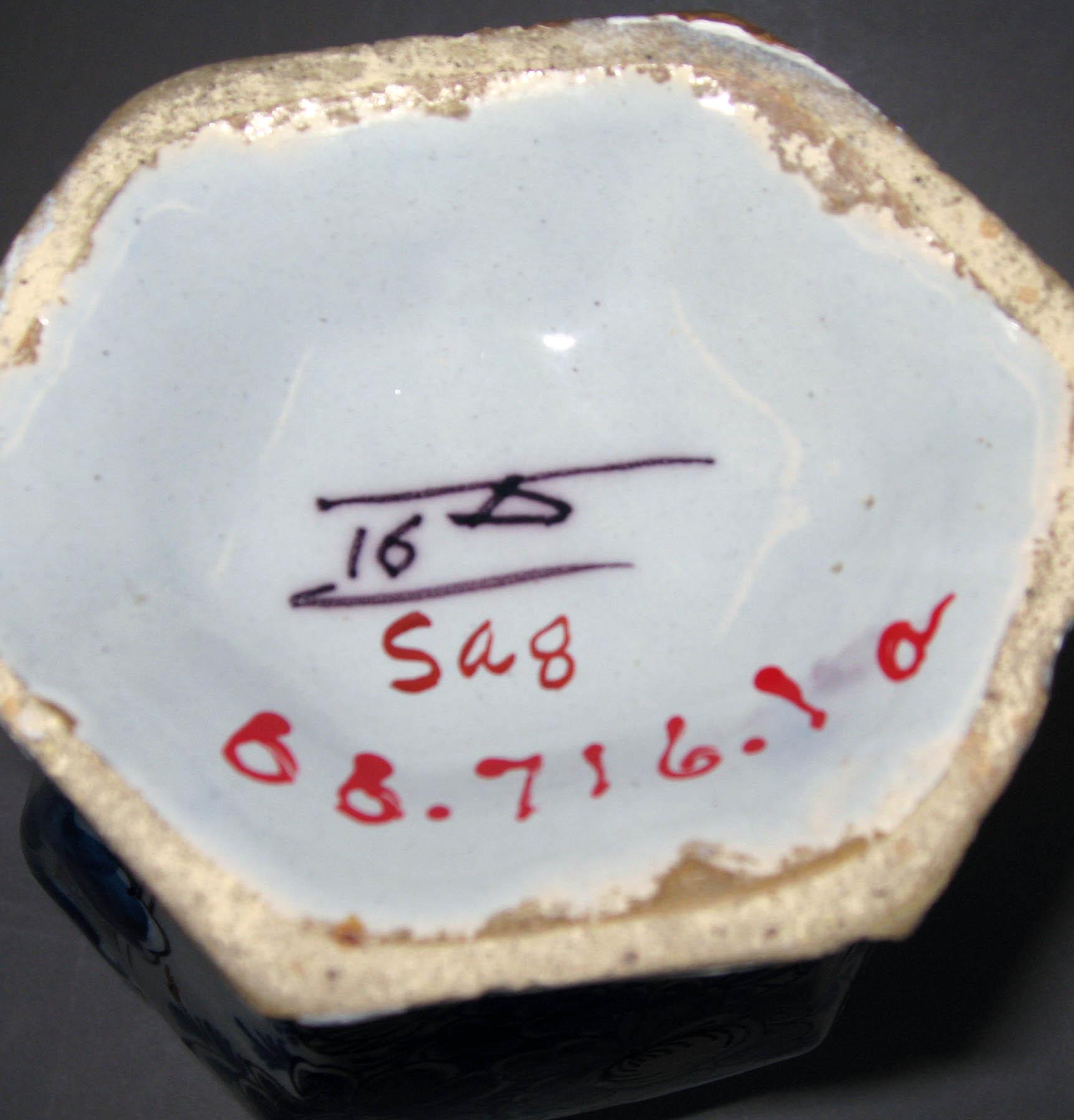 1966.0716.001 A, B Earthenware vase (mark)
