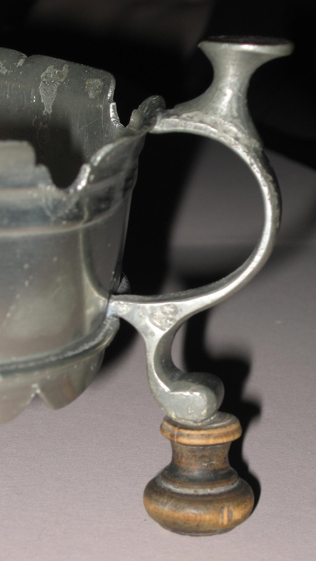 1966.0740 Pewter kettle stand (marked leg)