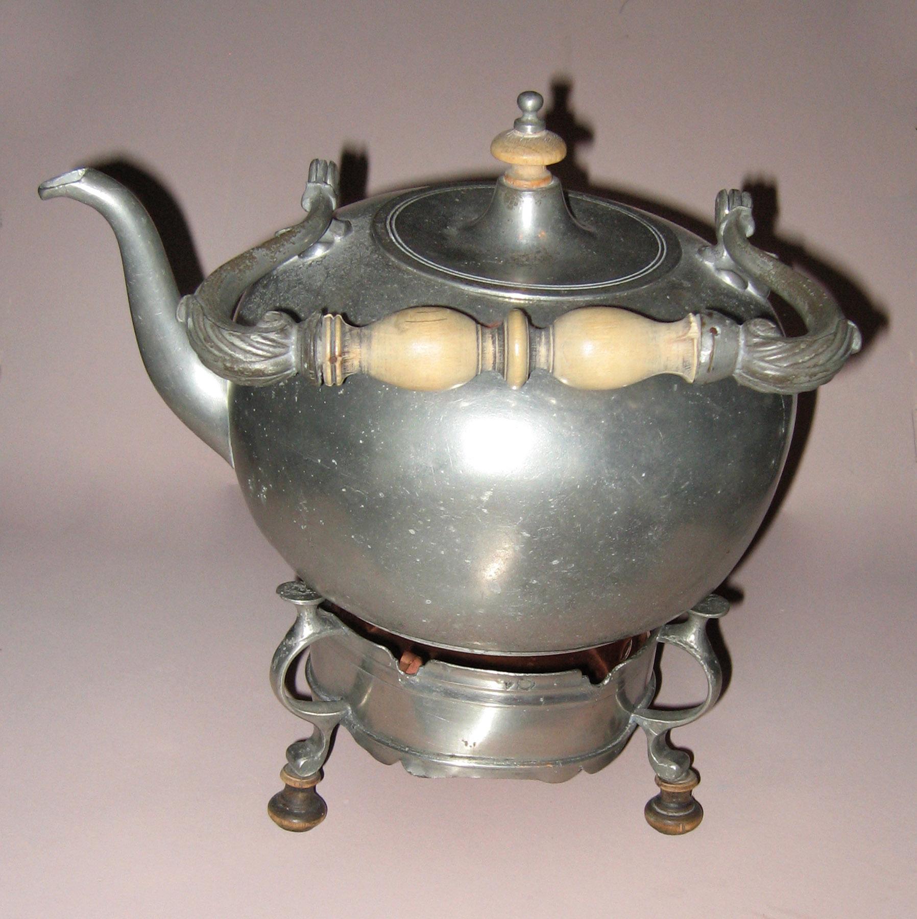 1966.0741, 1966.0740, 1966.0752 Pewter and copper kettle and stand