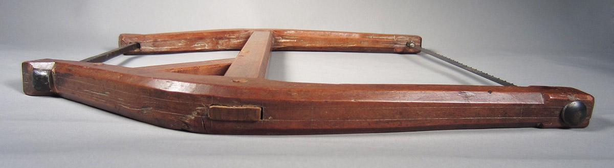 1957.0026.079 Frame saw, side 1
