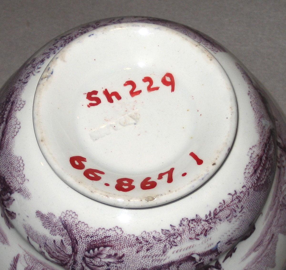 1966.0867.001 Columbus pattern transfer printed cup (mark)