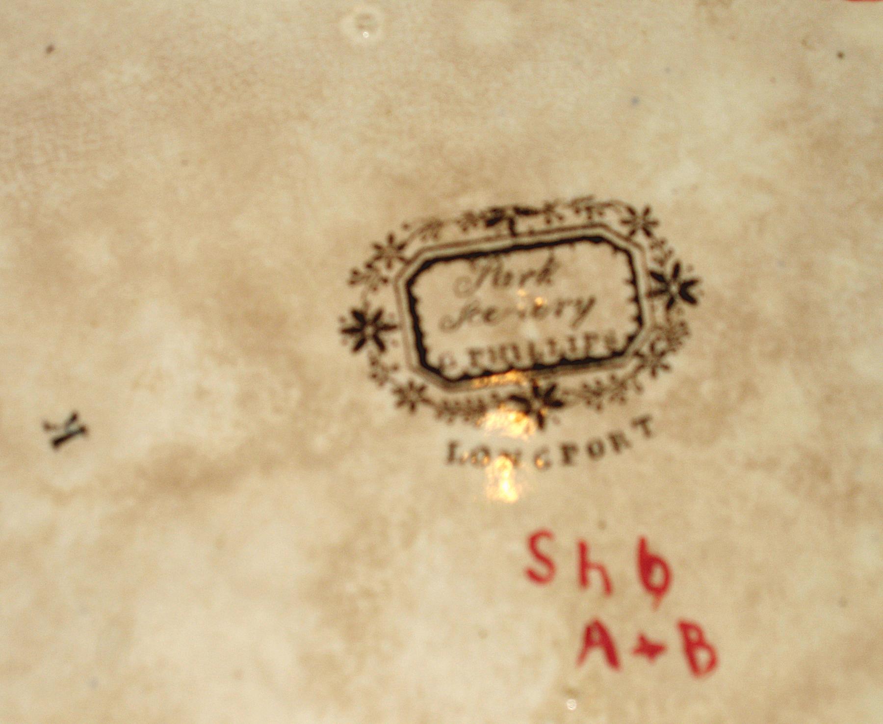 1966.0953 A Covered dish (stand mark)