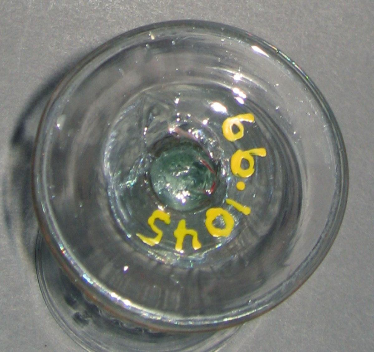 1966.1045 Colorless glass wineglass (underside)