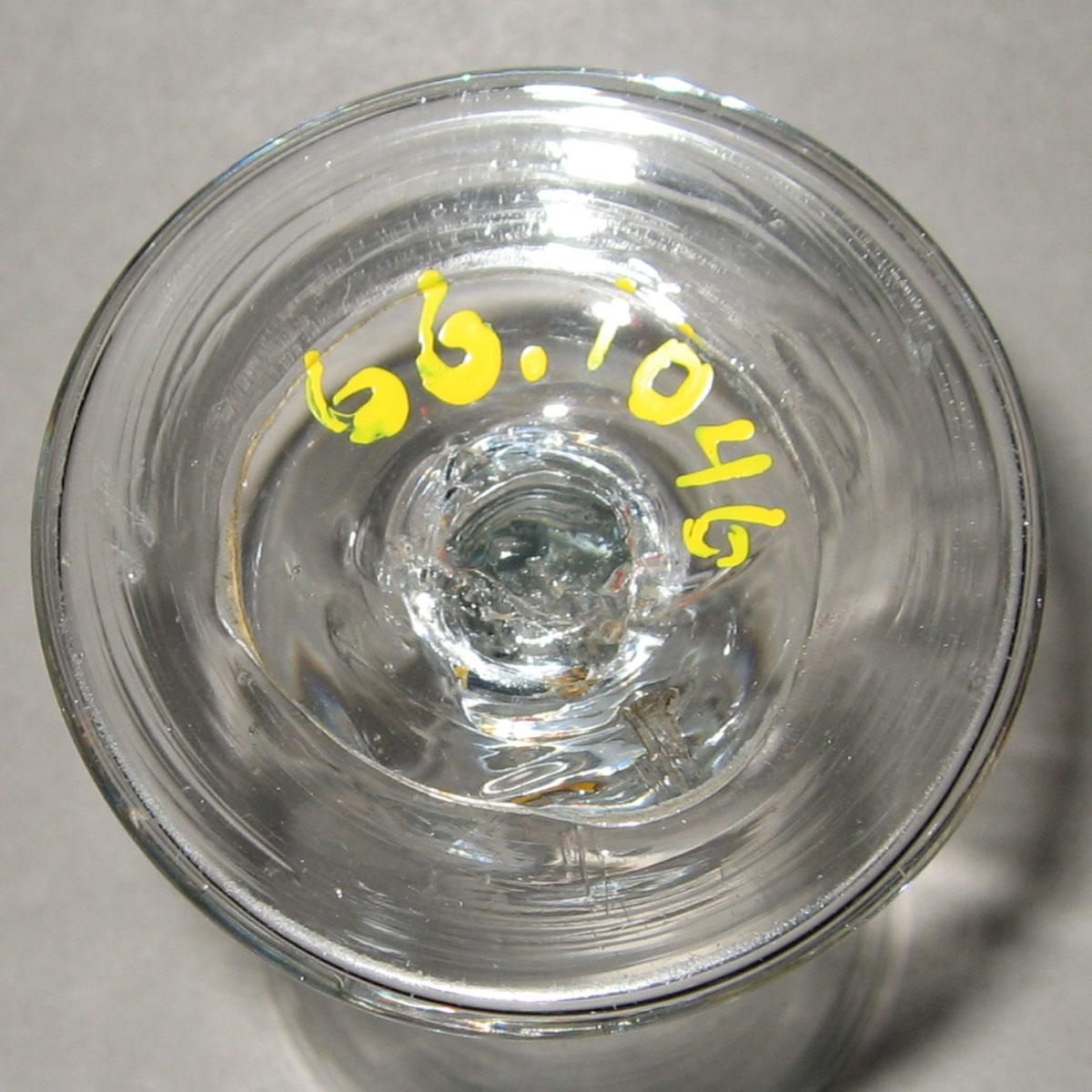 1966.1046 Colorless glass wineglass (underside)