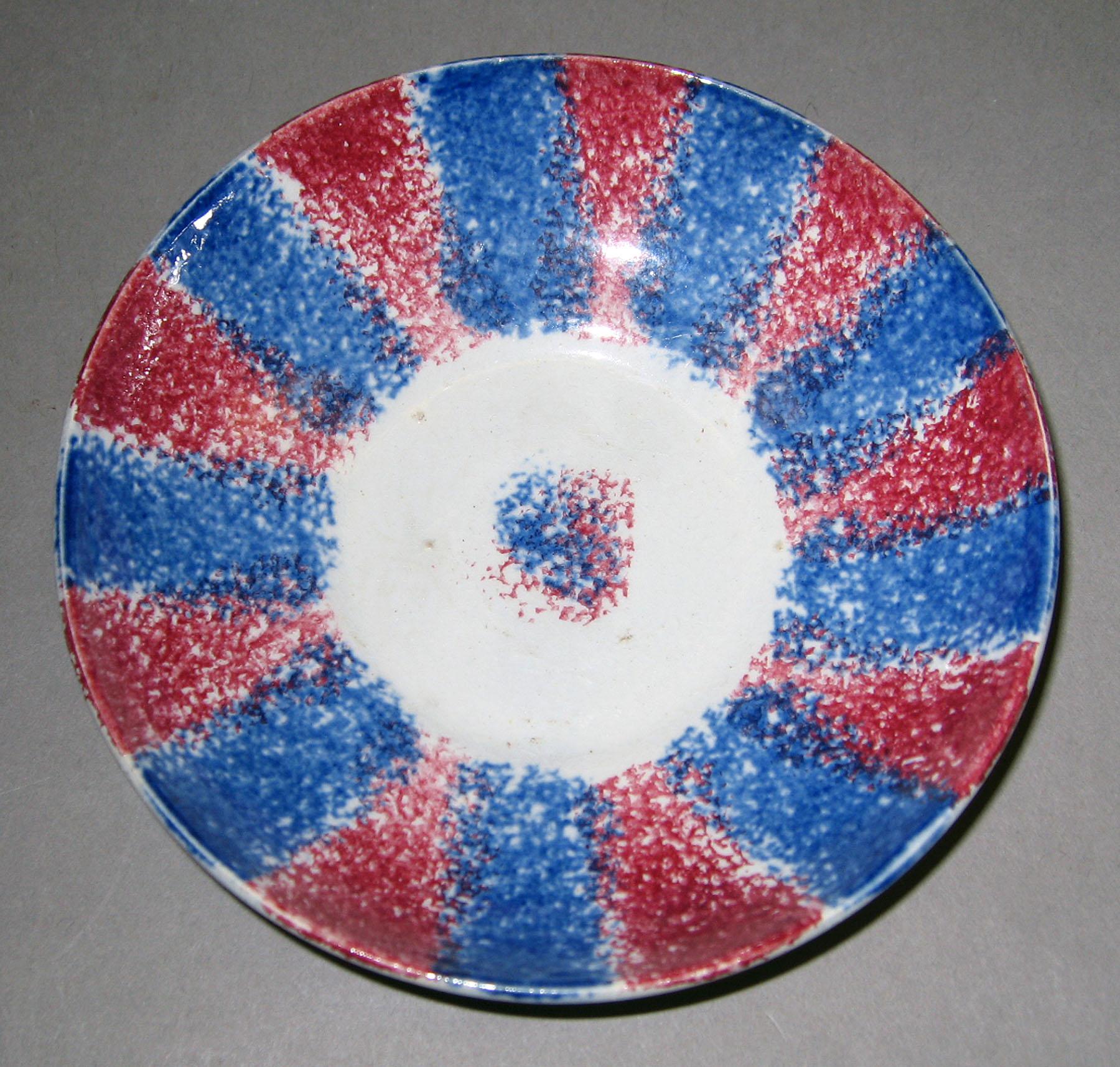 1966.1150.002 B Spatterware saucer