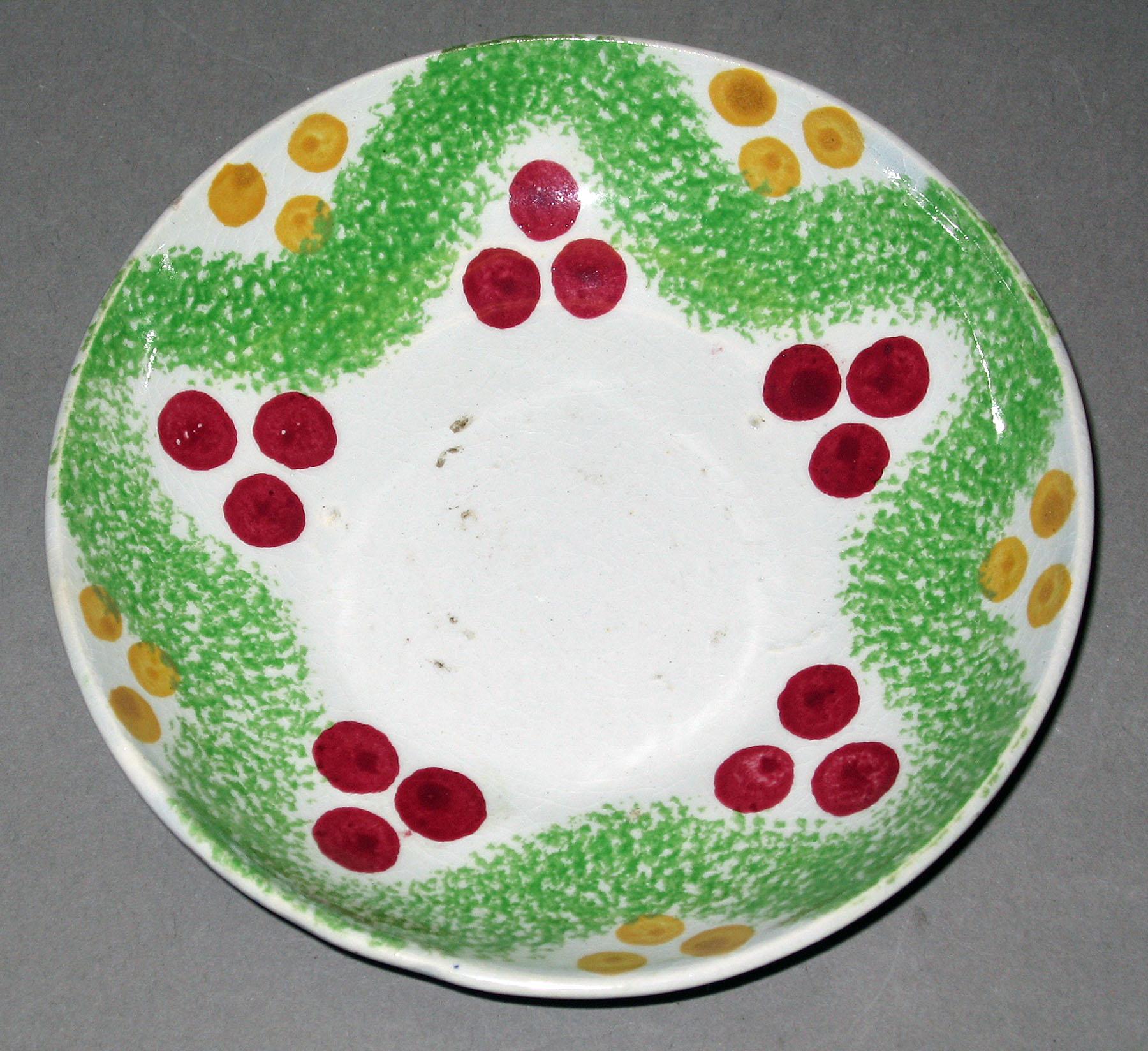 1966.1160 B Spatterware saucer
