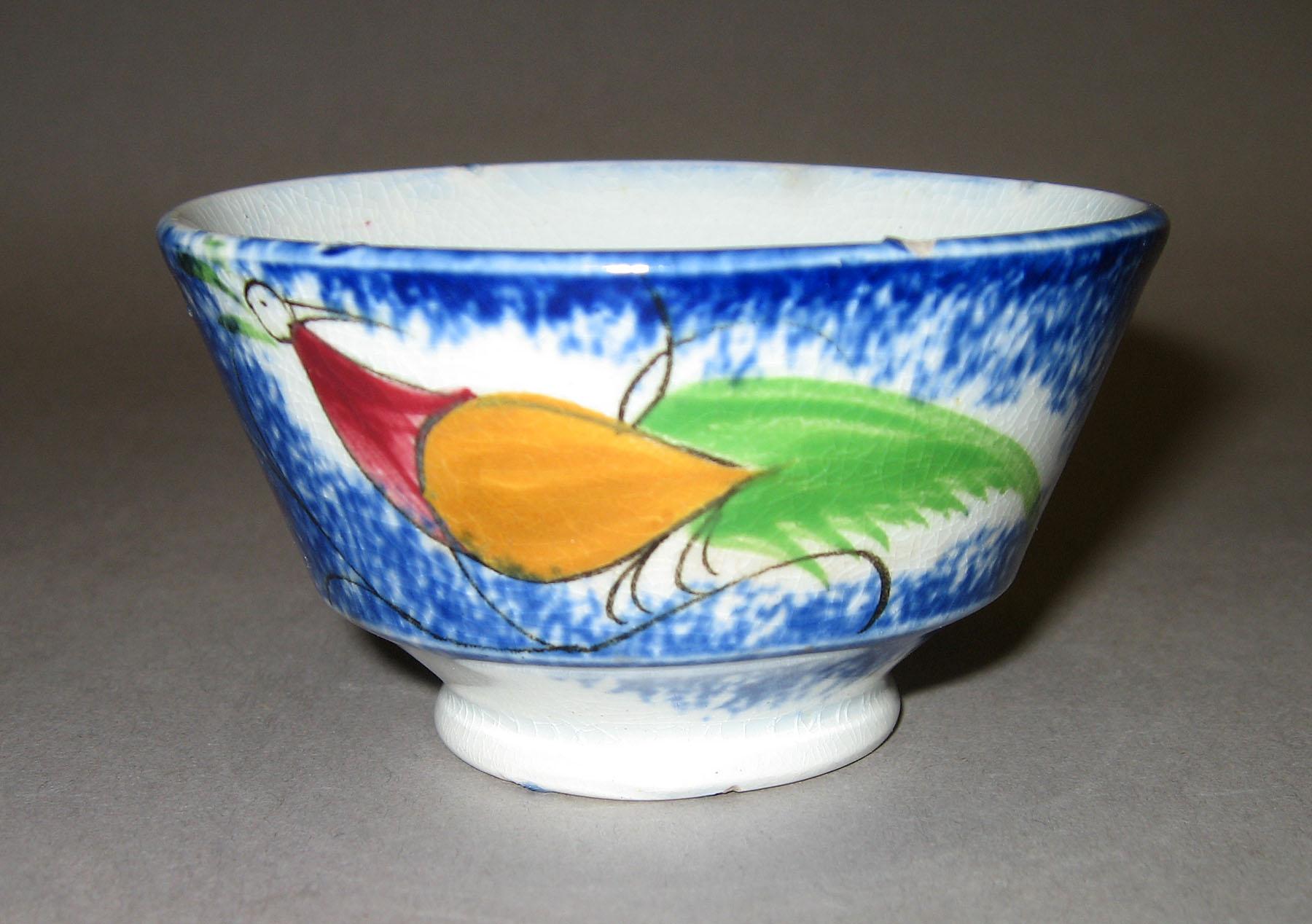 1966.1163 A Peafowl pattern spatter teabowl