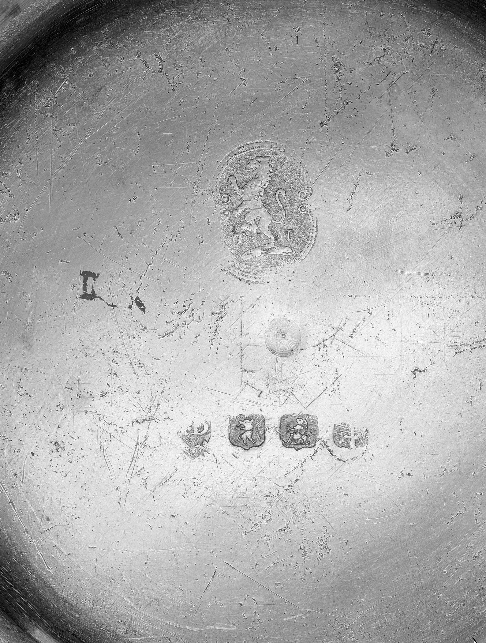 1966.1183 Pewter plate (marks)