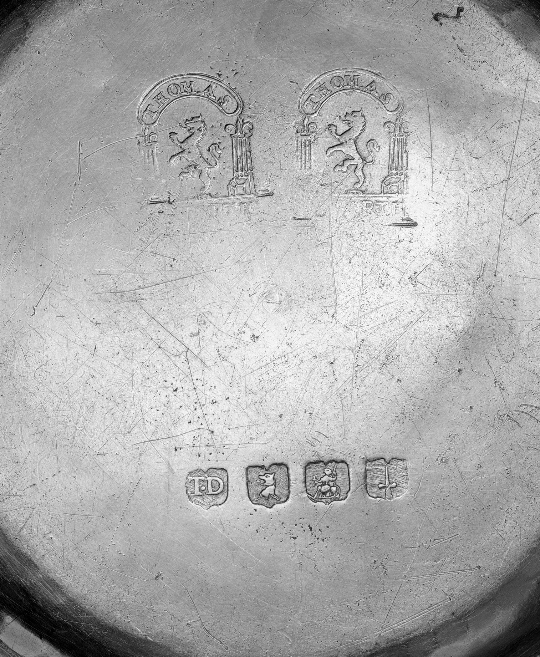 1966.1184 Pewter plate (marks)