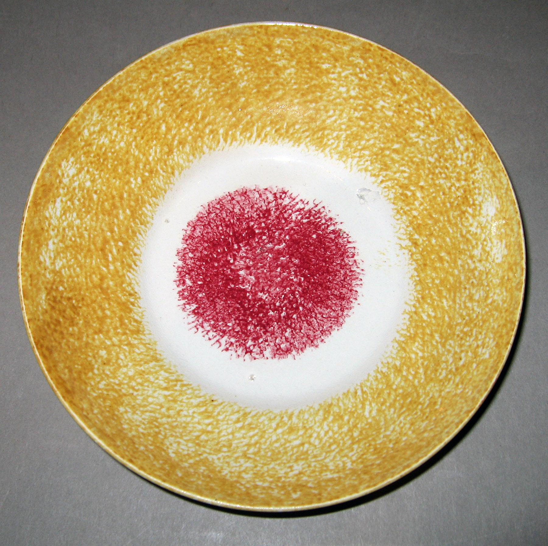 1966.1267.008 Spatterware saucer