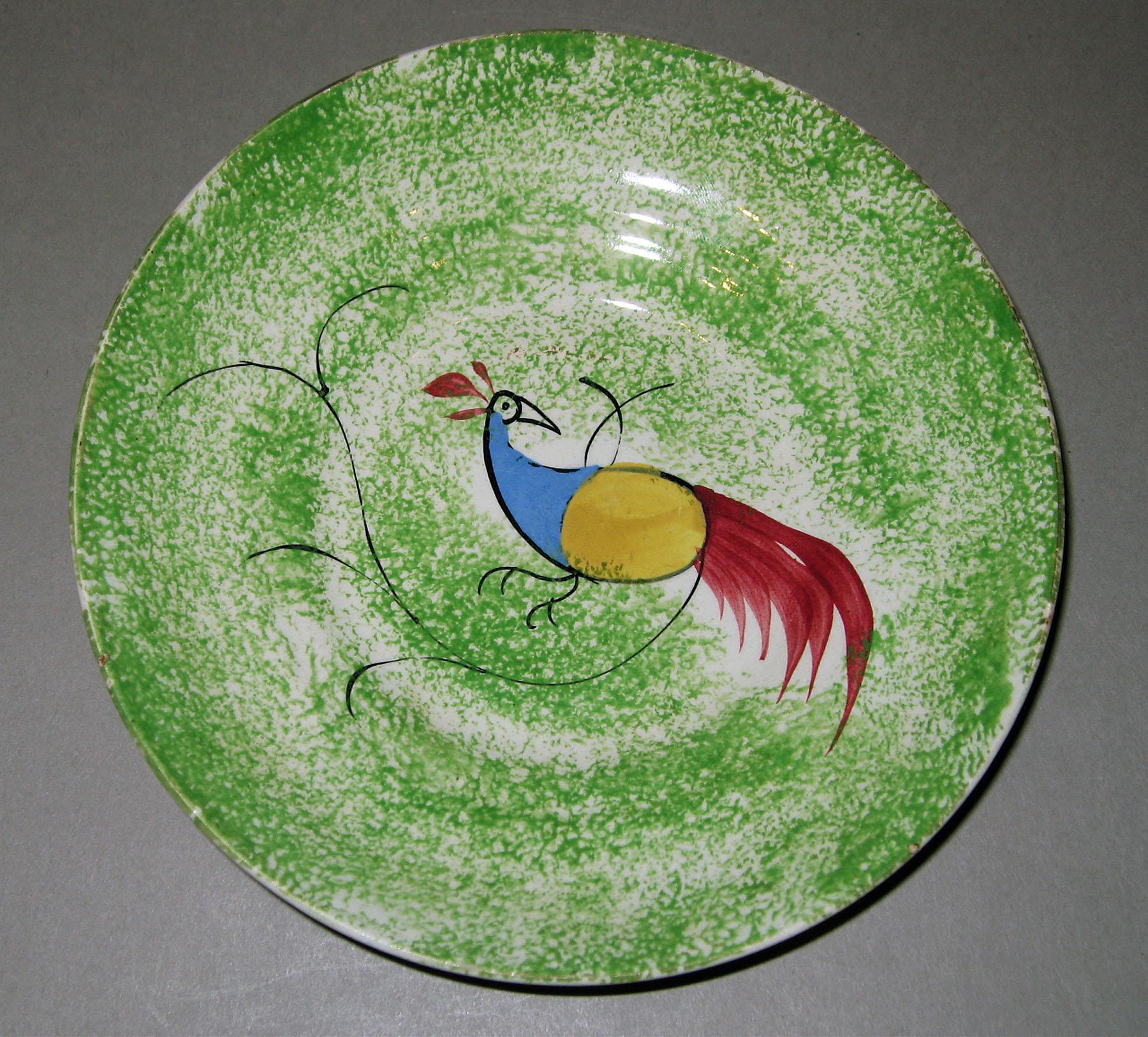 1966.1275.004 Spatterware saucer