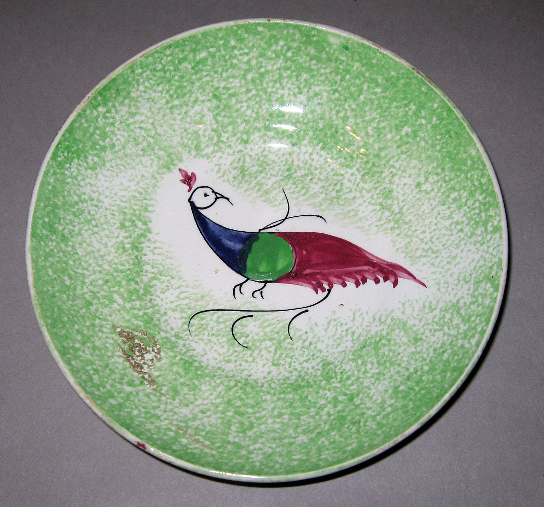 1966.1290.002 B Spatterware saucer