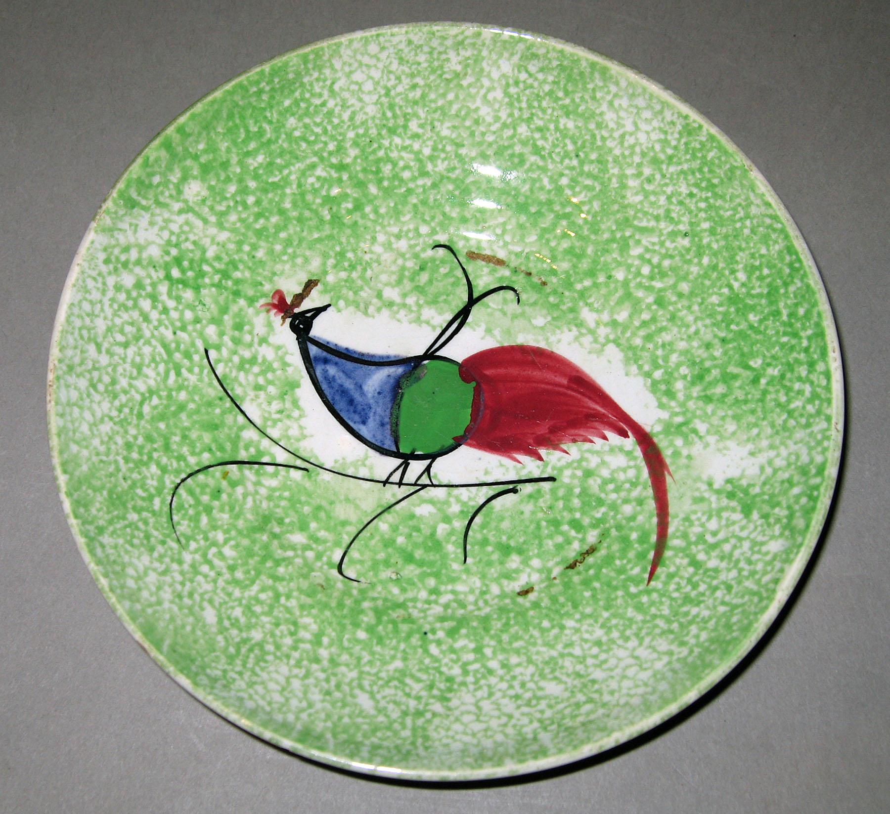 1965.1295.010 Spatterware saucer