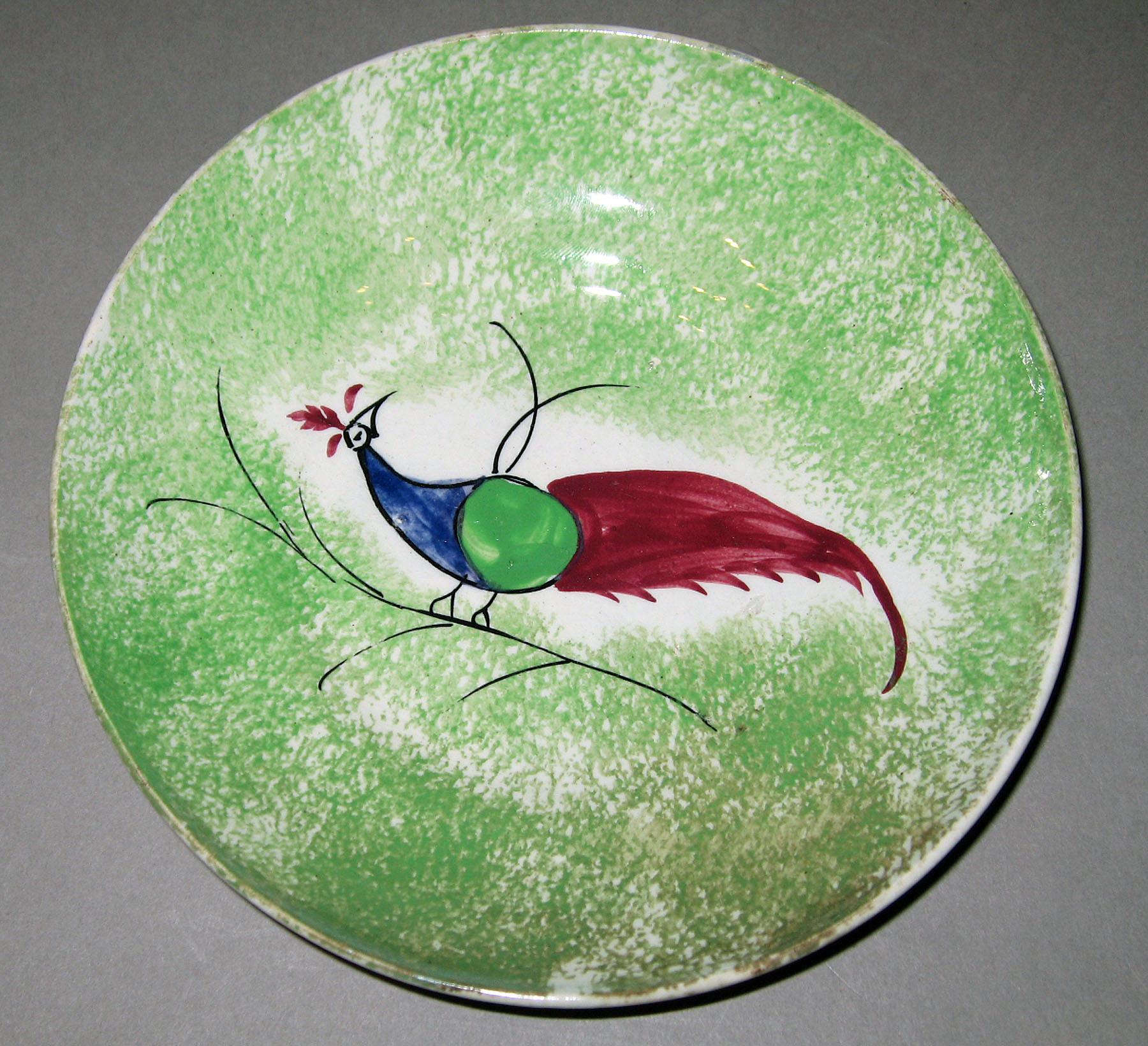 1966.1295.011 Spatterware saucer