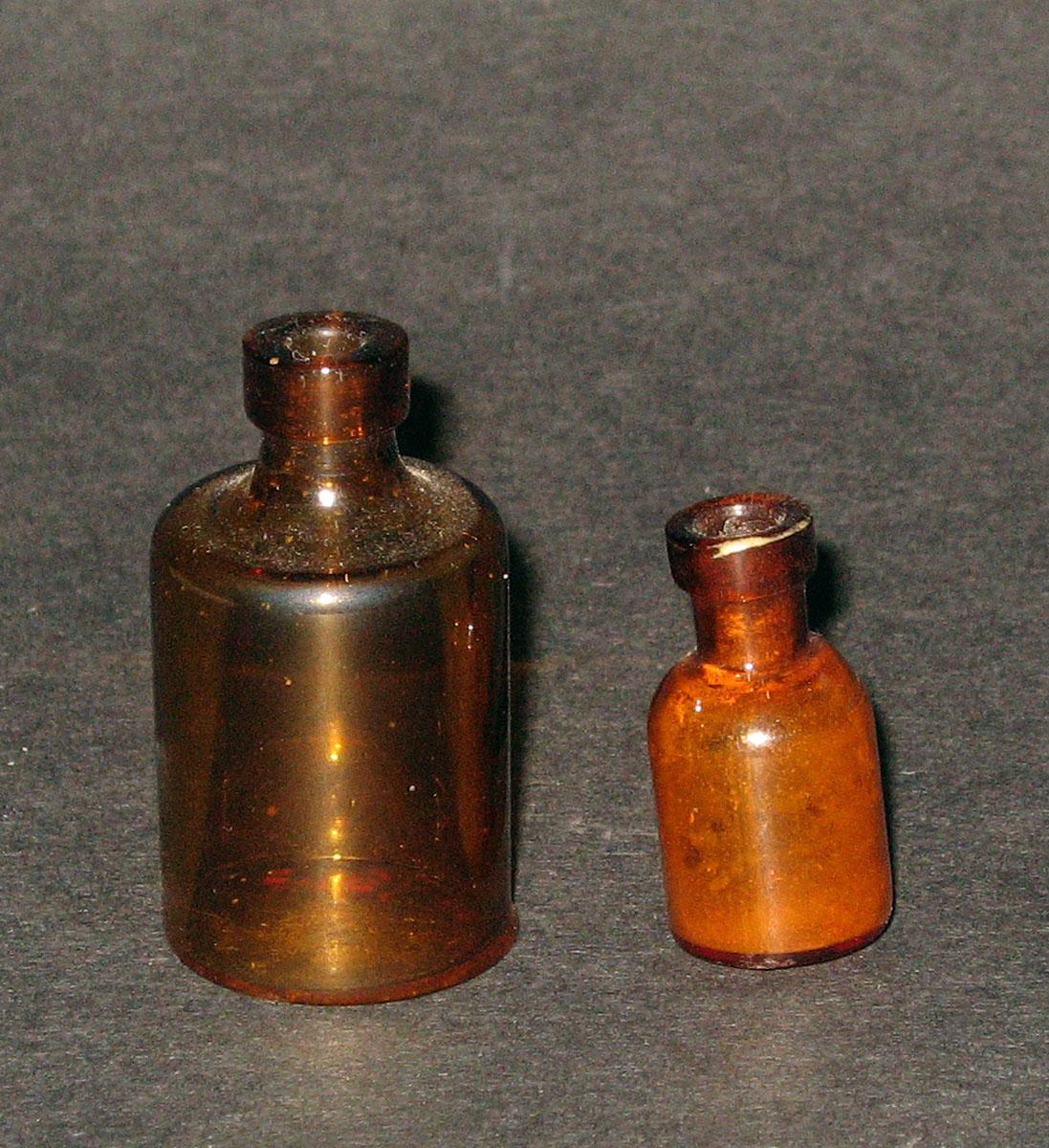 1966.1354, 1966.1353 Glass bottles