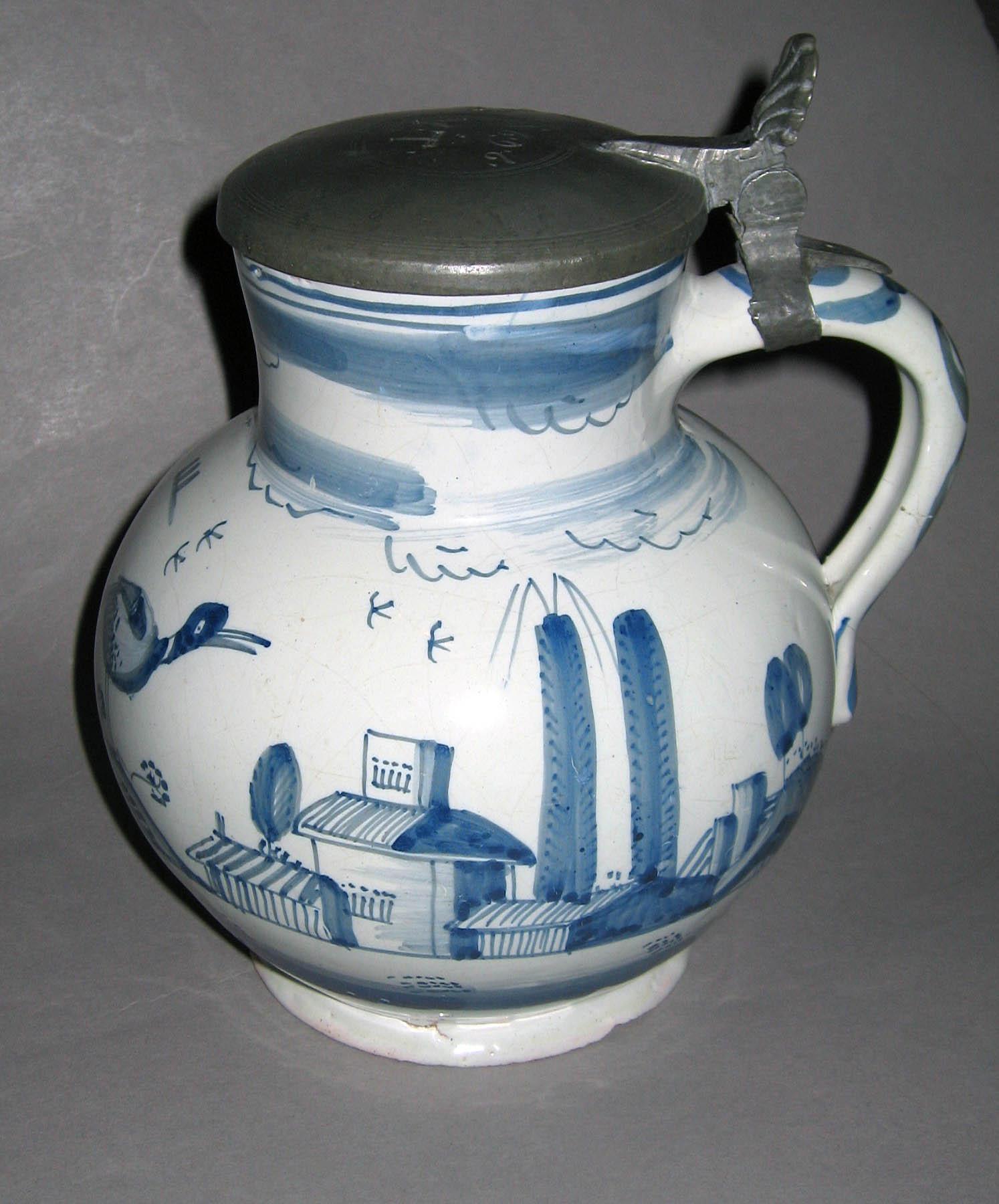 1966.1377 Delftware jug with metal cover