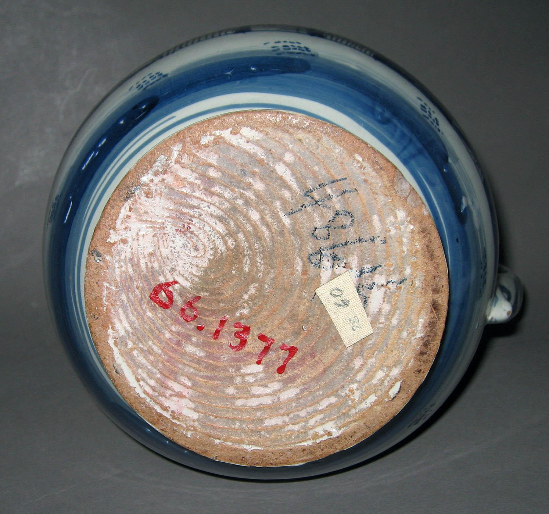 1966.1377 Delftware jug with metal cover (underside)