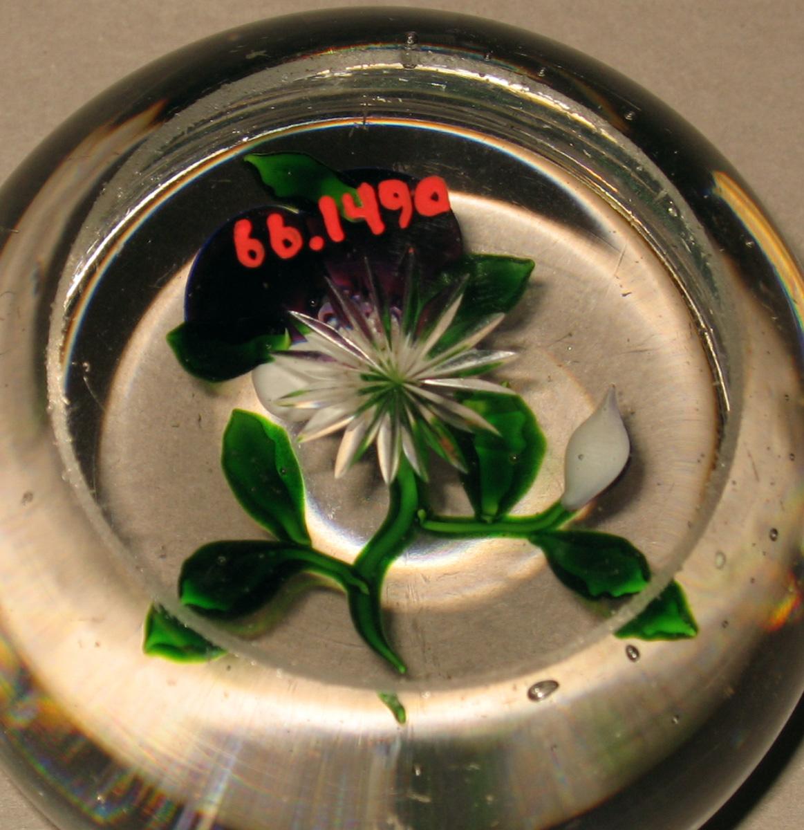 1966.1940 Glass paperweight (underside)