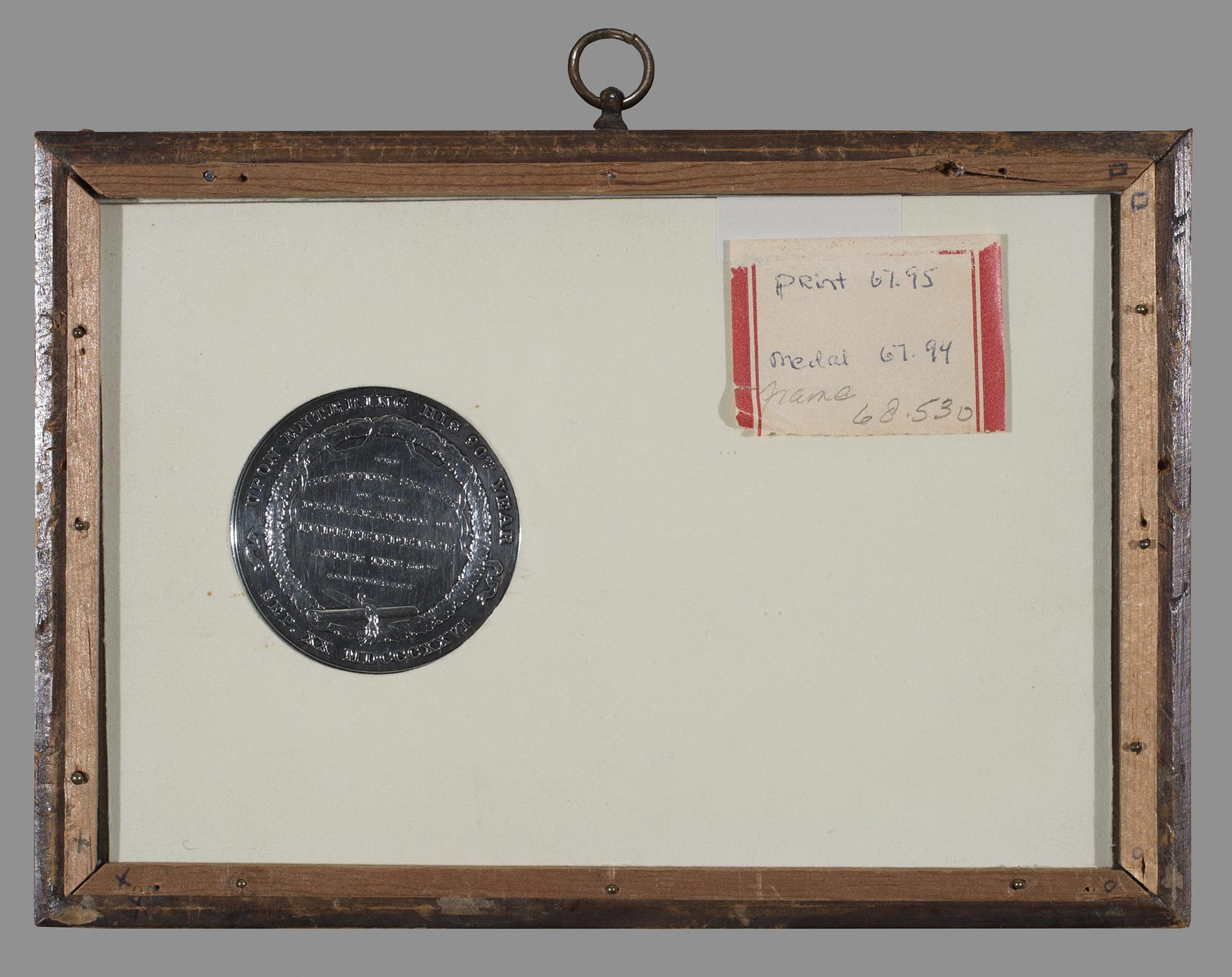 1967.0094 Medal, 1968.0530 Frame, view 1, reverse
