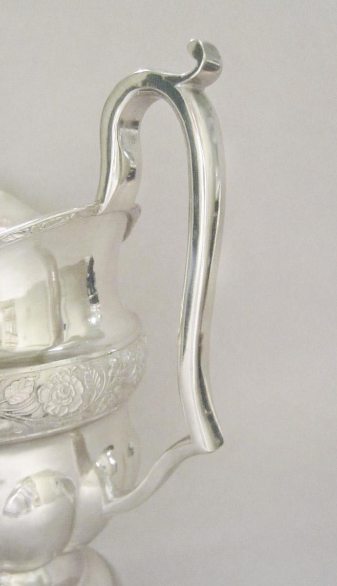 1967.0103.005 Cream pot, handle