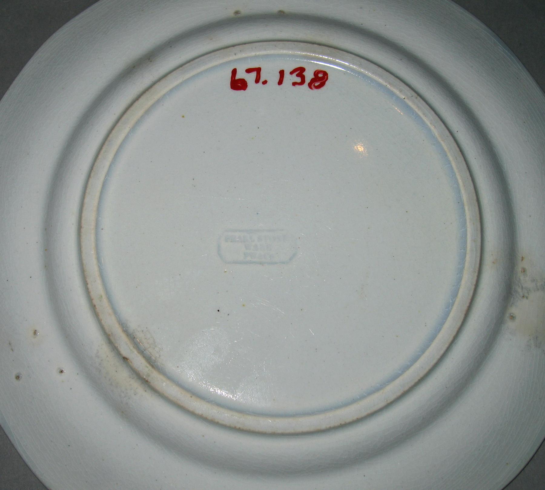 1967.0138 Blue spatterware and rose pattern plate (mark)