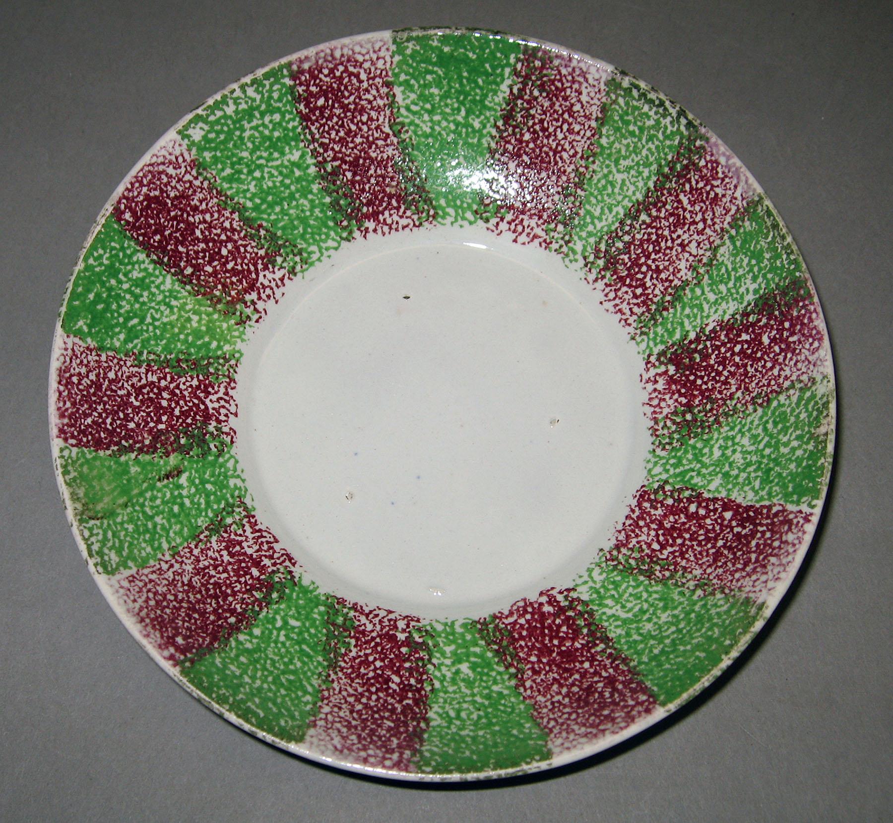 1967.0197 A Spatterware saucer