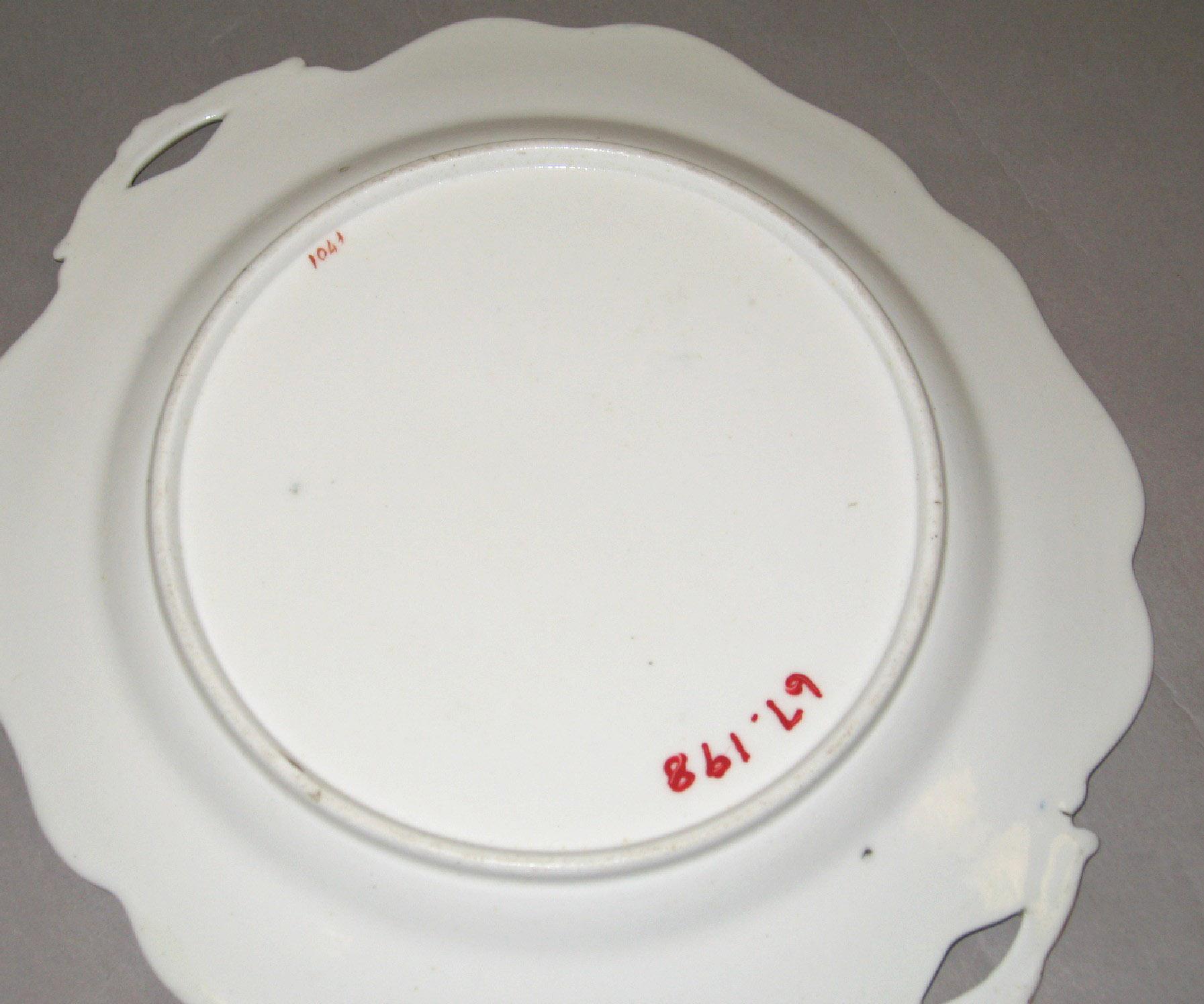 1967.0198 Soft-paste porcelain dish (underside)