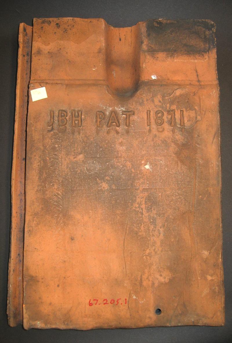 1967.0205.001 Roof tile (underside and mark)
