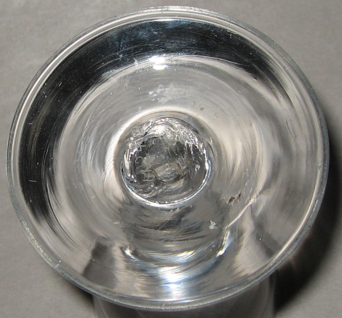 1967.0240 Colorless glass wine glass (underside)