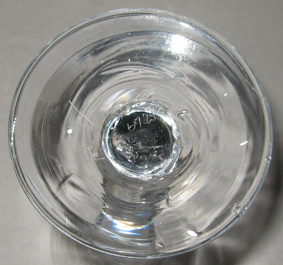 1967.0242 Glass wine glass (underside)