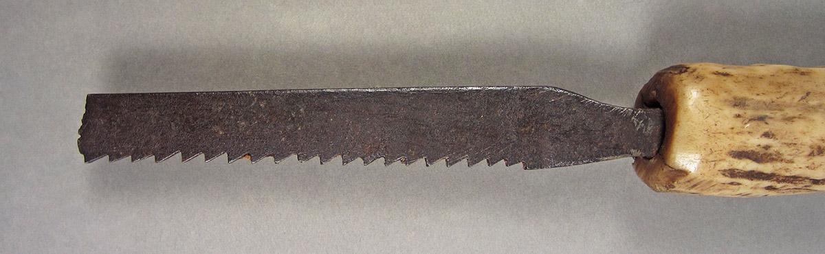 1957.0026.215, Keyhole saw, blade side 1
