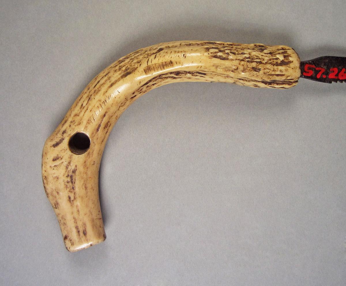 1957.0026.215, Keyhole saw, handle side 1