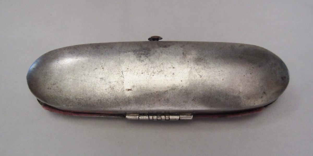 1967.0504 Spectacles case, underside