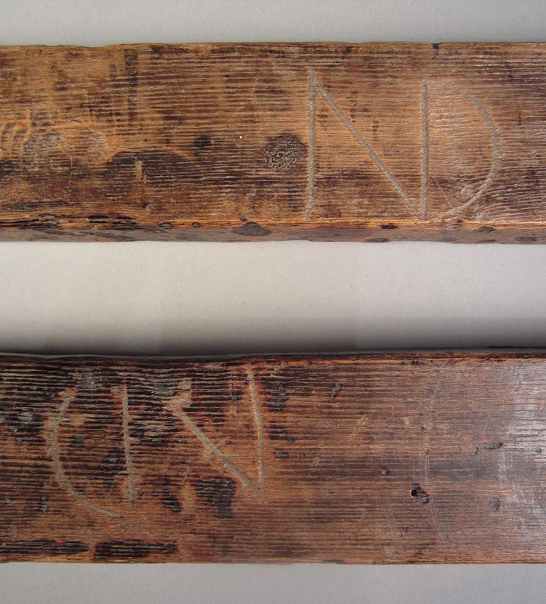 1957.0026.219 A-D Clamp, marks
