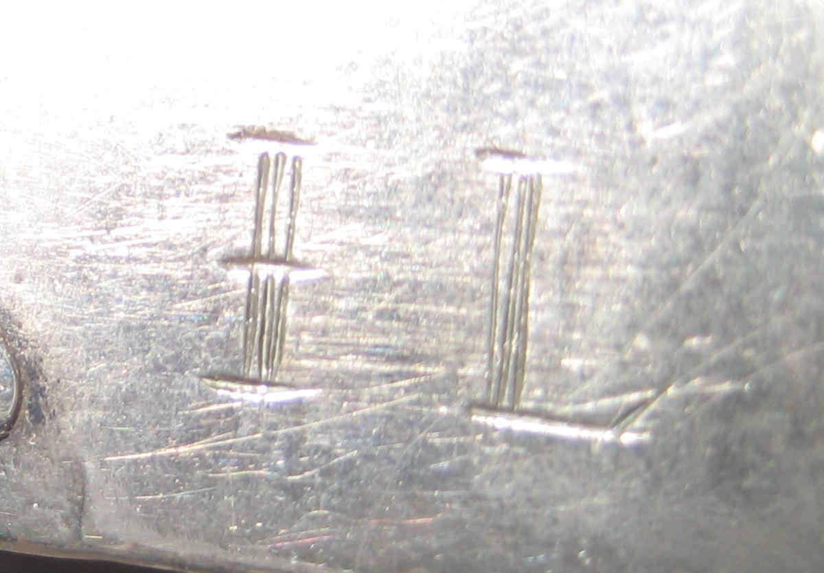 1967.0618 A Buckle (mark)