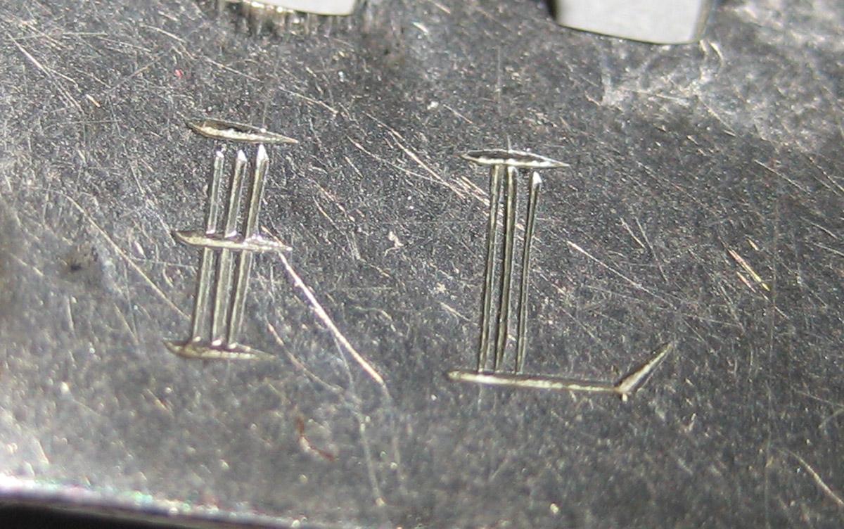 1967.0618 B Buckle (mark)